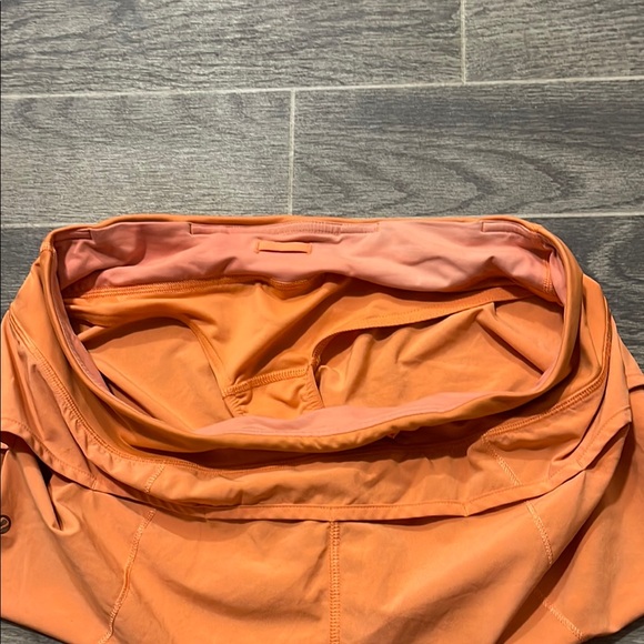 lululemon Speed Up Orange Shorts - Picture 9 of 10